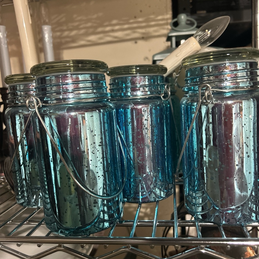 blue glass jar handle candle jars! 6 of them! Super cute and barely used!